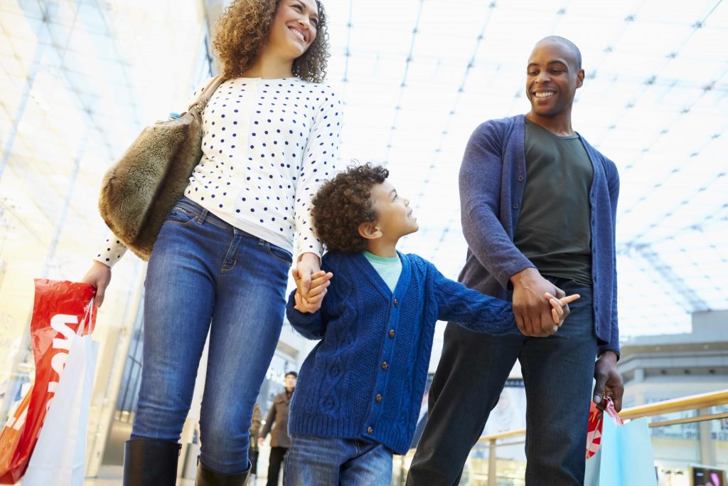 a picture of a family in a mall